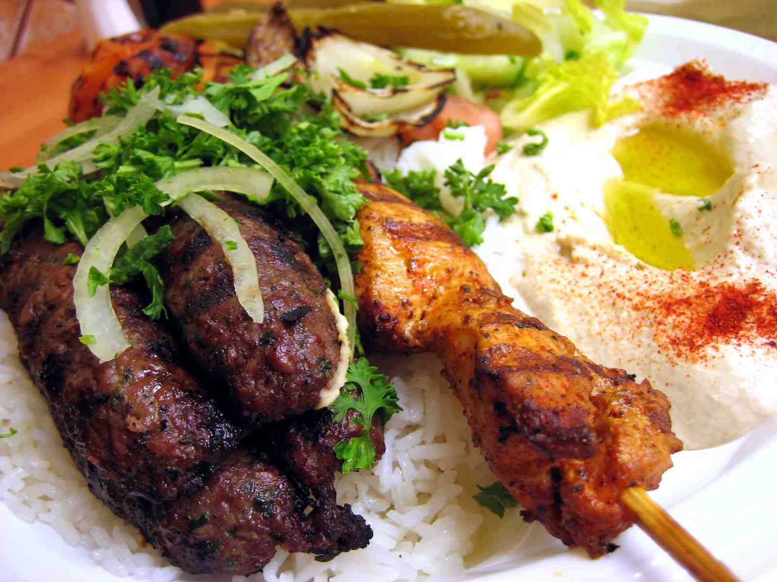 Freshly grilled Lebanese dishes plated at Restaurant Basha in Dollard-des-Ormeaux