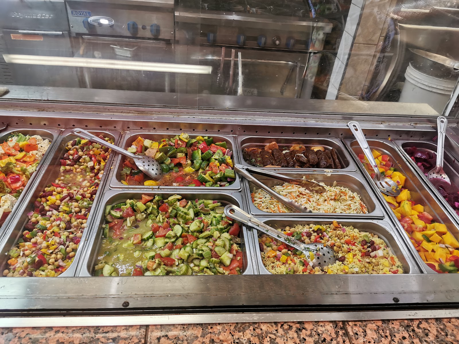Generous Lebanese platter with garlic sauce and salad